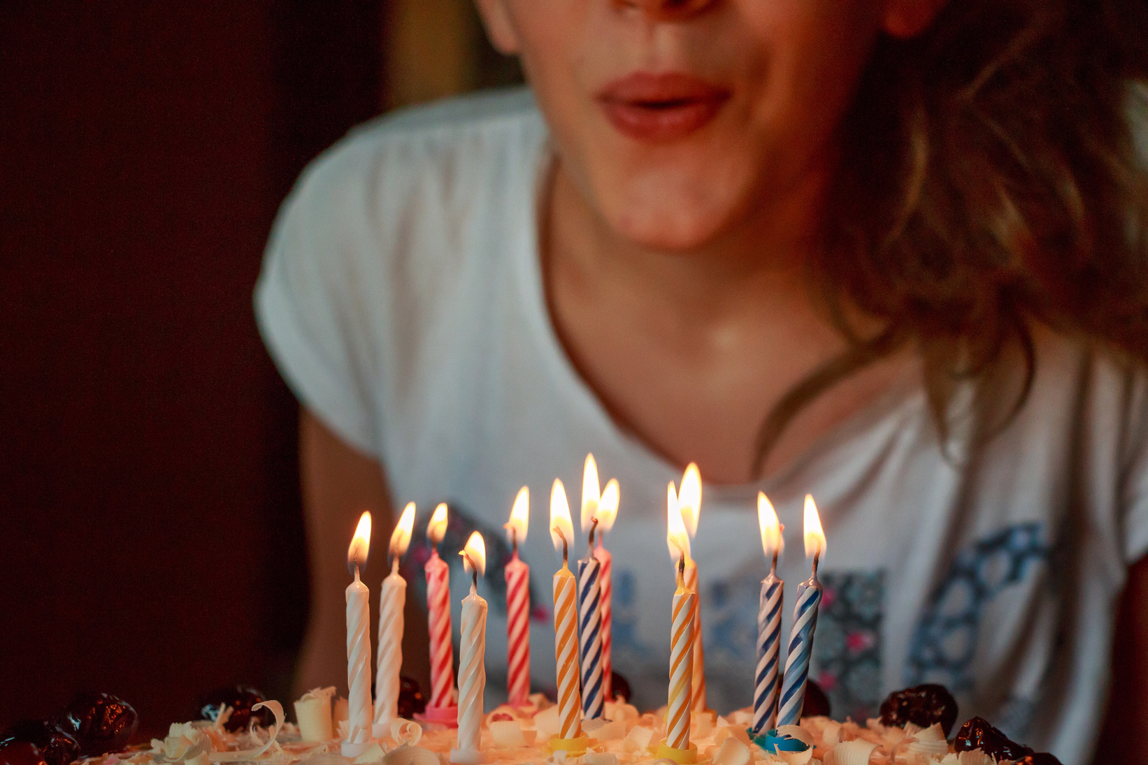 Birthday Girl Blowing Cake Candles